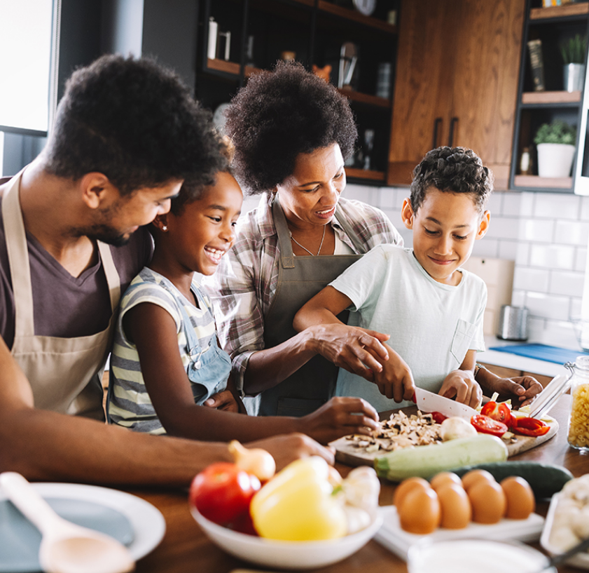 african american family cooking with children