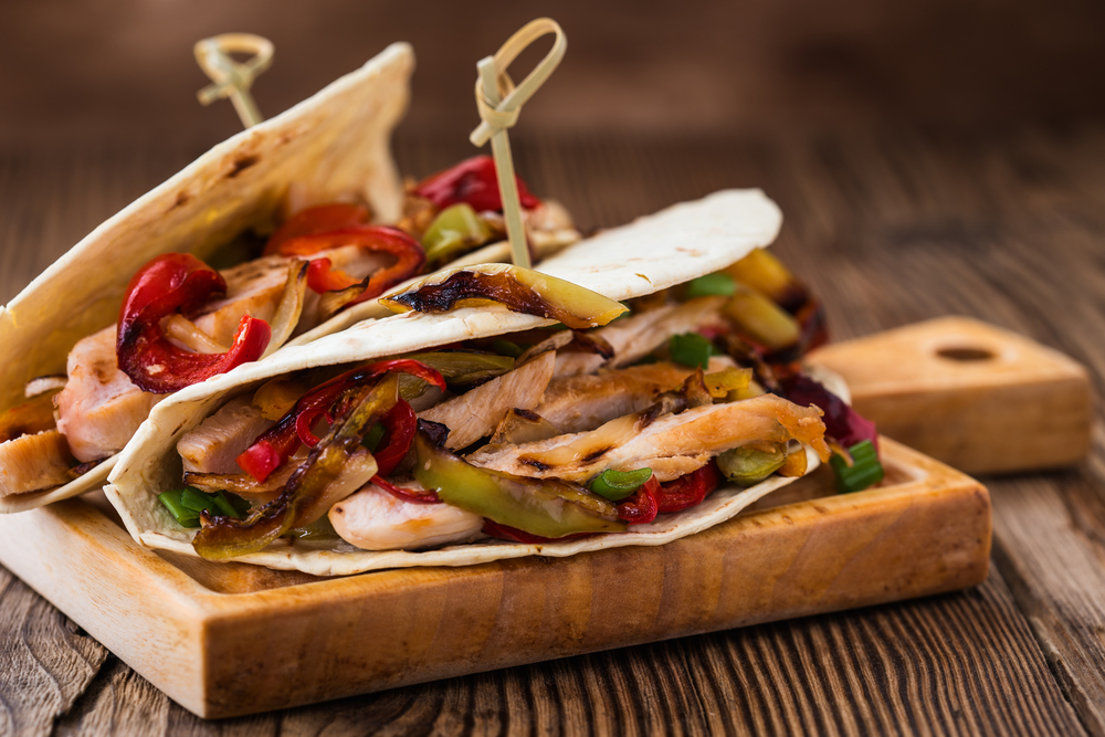 Chicken,Fajitas,With,Grilled,Onions,And,Bell,Peppers,And,Serve