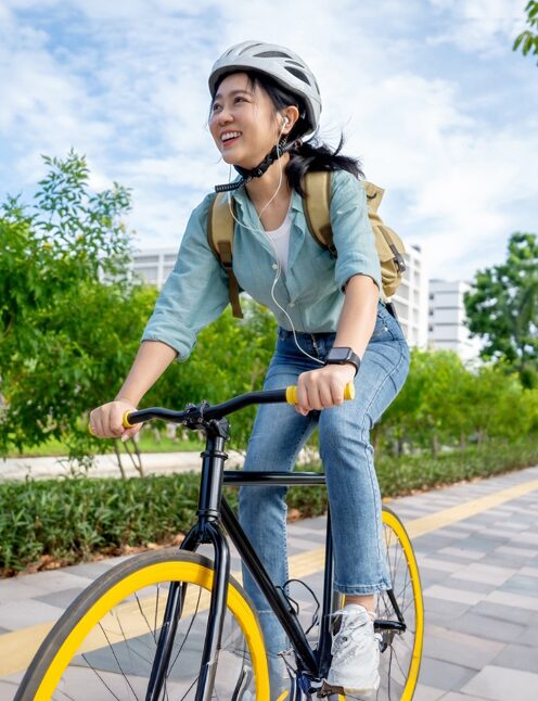 Young Asian Lady Riding Bike